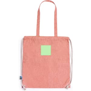 A peach-coloured drawstring bag with light green square patch and natural drawstrings, featuring a logo.