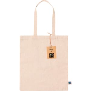 A light beige tote bag with long handles and a tag. It features a small logo on the side.