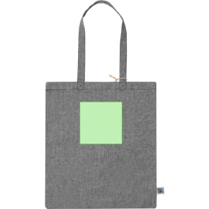 A grey tote bag with two handles and a light green square patch. It features a logo on the side.