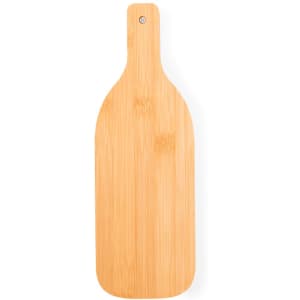 A bamboo cutting board shaped like a wine bottle, featuring a smooth surface and a hanging hole at the handle.