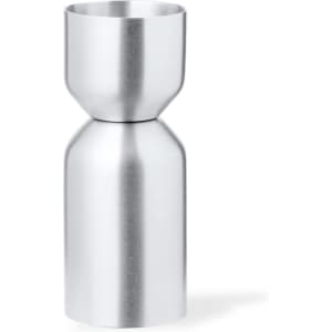 A stainless steel jigger with a streamlined design, featuring a metallic finish and a branding logo.