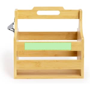 A drink bottle holder made of bamboo featuring a green accent and a handle for easy carrying.