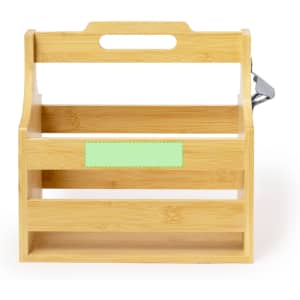 A wooden drink bottle holder in natural bamboo, featuring a handle and a metal opener attached.