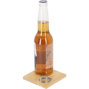 A drink bottle sits on a wooden coaster with a built-in bottle opener. The coaster has a circular metal opener.