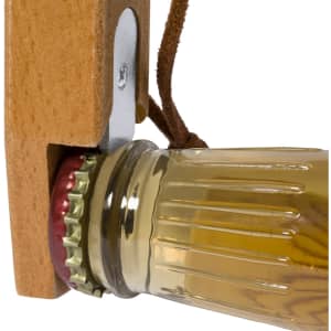 A drink bottle opener with a wooden handle, featuring a metallic opener and a glass bottle with a cap.