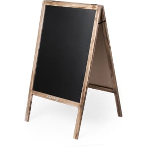 A wooden A-frame whiteboard with a dark writing surface and a logo at the bottom.