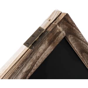 A wooden whiteboard frame with a brass hinge, featuring a black writing surface and a rustic finish.