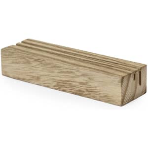A wooden block with a natural finish, featuring grooved sides for potential display use.
