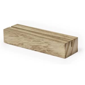 A wooden business card holder with a natural finish, featuring a simple rectangular design and a groove for cards.