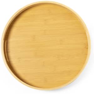 A round bamboo tray with a smooth, natural finish and a simple design. It features a subtle logo.