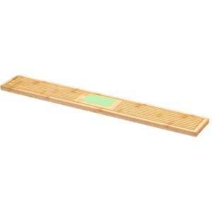 A bamboo bar runner featuring a rectangular design with slatted grooves and a central logo area in green.