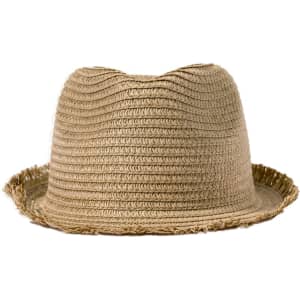 A straw hat in a natural beige colour with a frayed edge, featuring a circular design and a subtle logo.