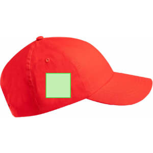A red cap featuring a blank square area for customisation, with a curved brim and an adjustable strap at the back.