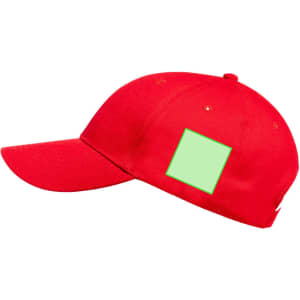 A red cap featuring a green patch area for customisation. The design includes a standard structured fit.