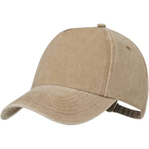 A tan cap with a curved brim, featuring a ventilation hole and an adjustable strap at the back. It has a logo.