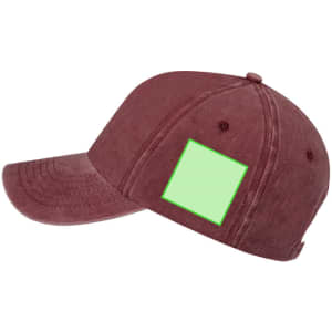A maroon cap featuring a blank green patch on the side. The cap has a curved brim and a classic design.
