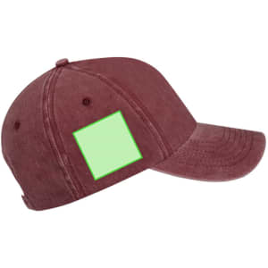 A maroon cap with a green blank patch for custom branding or decoration. Features a curved peak and adjustable strap.