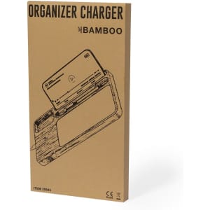 A bamboo wireless charger and organiser displayed in a brown packaging box with a logo.