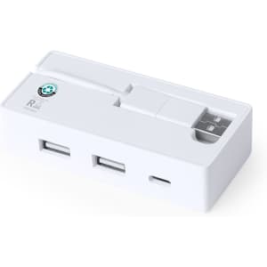A white USB hub featuring multiple ports and a built-in USB connector, along with a logo.