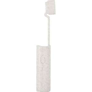 A lamp with a white, speckled design and an adjustable arm. It includes a logo on the base.