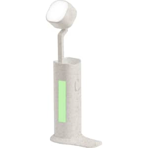 A white lamp with a green accent, featuring a flexible neck and a base for stability. It has a logo on its surface.