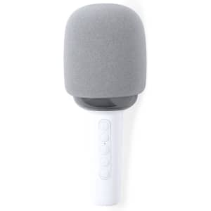 A grey microphone speaker with a smooth surface and a white handle featuring control buttons.