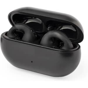 A pair of black earphones in a sleek charging case, featuring a rounded design and a logo on the front.