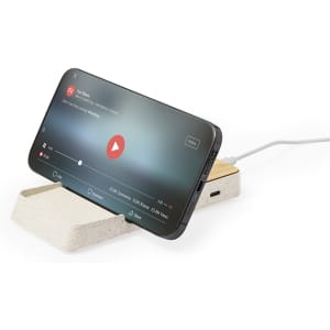 A wireless charger in grey and wood, supporting a phone in an upright position. It features a logo on the base.
