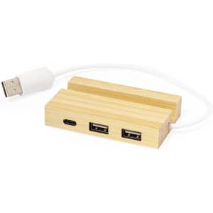 A bamboo USB hub featuring one USB-C port and two standard USB ports, connected by a white cable.