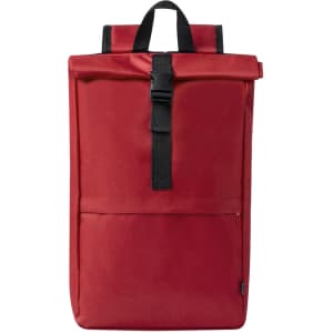 A red Vaega Backpack with a roll-top design and a front zip pocket. It features a black strap and a branding logo.