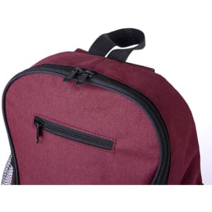 A maroon backpack with a black zip and a front pocket, featuring a textured fabric and a loop for hanging.