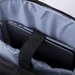 A black wheeled backpack with a blue interior, featuring a compartment for a tablet or laptop.
