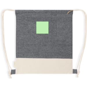 A drawstring bag featuring a grey canvas body with a light green square and a cream bottom section. It has a logo.