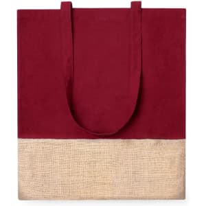 A burgundy tote bag with a natural jute lower section, featuring two sturdy handles and a logo.
