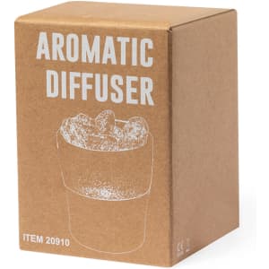 A brown cardboard box with graphics of a pot and contents, labelled as an aromatic diffuser. It has a logo.