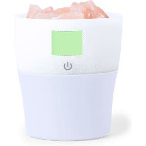 A white and lavender aromatherapy diffuser filled with pink Himalayan salt crystals and featuring a power button.
