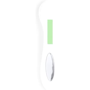 A white face massager with a green silicone section and a reflective silver surface. It features a simple, ergonomic design.