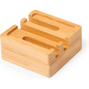 A bamboo organiser with multiple slots for holding office supplies. The design is simple and natural in colour.