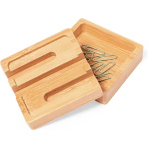 A bamboo organiser with a removable lid, featuring compartments for paper clips and other small office items.