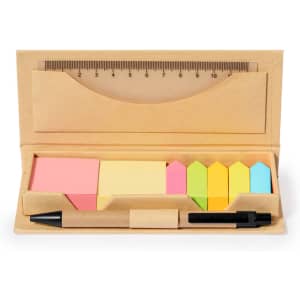 A stationery set featuring a black pen, various colourful sticky notes, and a ruler in a brown cardboard holder.