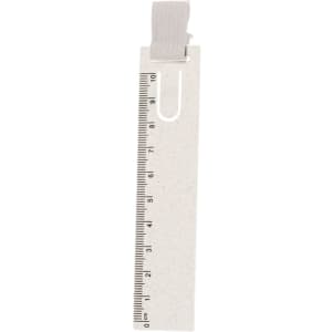 A white ruler bookmark with a ribbon loop at the top, featuring measurement markings along the edge.