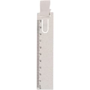 A white ruler bookmark features a measuring scale and a fabric loop at the top.