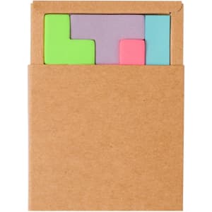 A kraft cardboard notepad holder contains colourful sticky notes in shades of green, pink, purple, and blue.