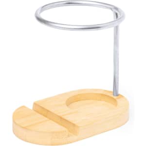 A bamboo pencil holder with a silver metal ring for holding pens or pencils, featuring a curved base.