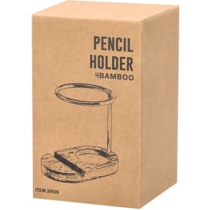 A bamboo pencil holder in a cardboard box, featuring a circular holder and a flat base.