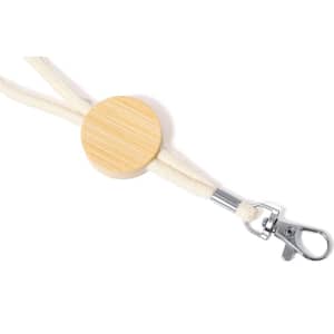 A lanyard featuring a round wooden attachment and white straps, with a silver clip at the end.