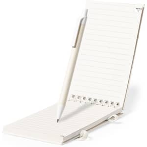 A Heiwor Notebook in cream with a matching pen, featuring lined pages and a minimalist design.
