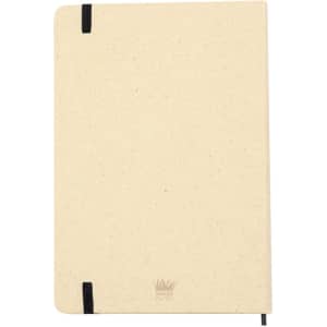A cream notepad with a textured cover and black elastic band closures, featuring a logo on the front.