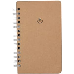 A brown notebook with a spiral binding and a logo on the front cover.