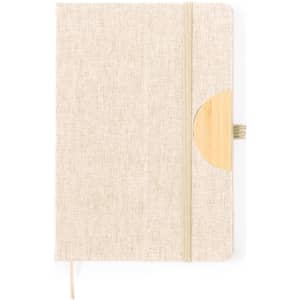 A beige notepad with a bamboo accent and an elastic closure, featuring a simple and elegant design.